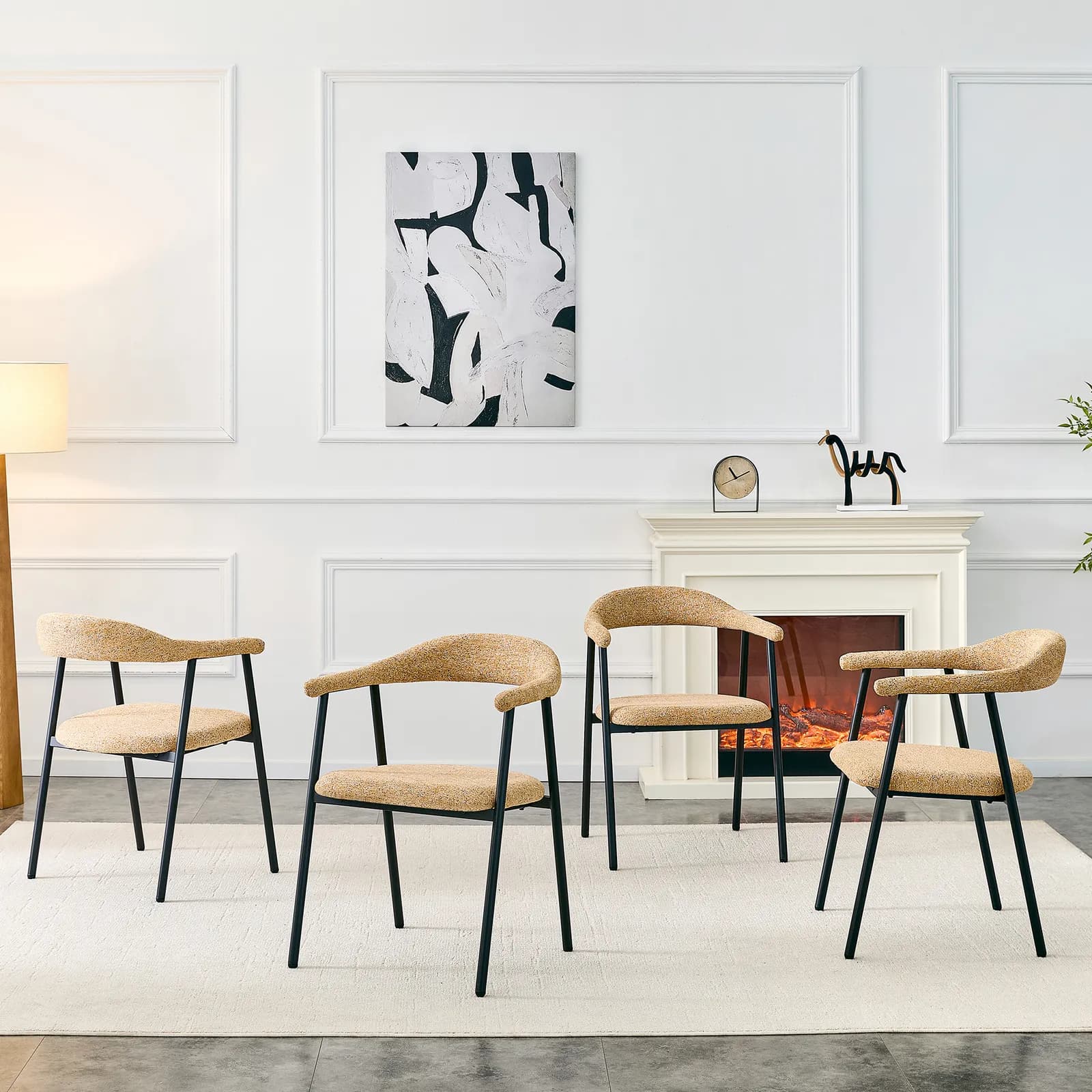 A 4-piece set of light khaki fabric dining chairs with sleek black metal legs, Minimalist…