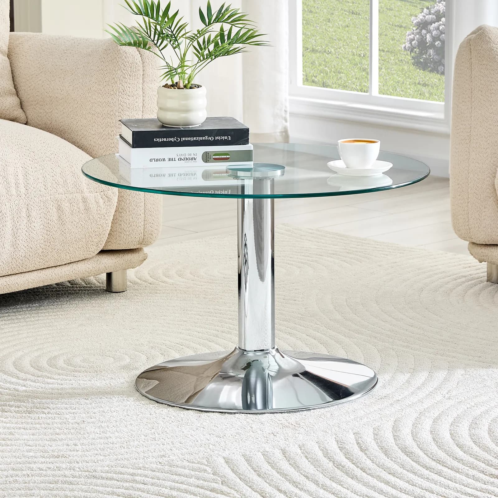 27, 5-inch diameter round tempered glass coffee table, 17, 7 inches high, supported by a…