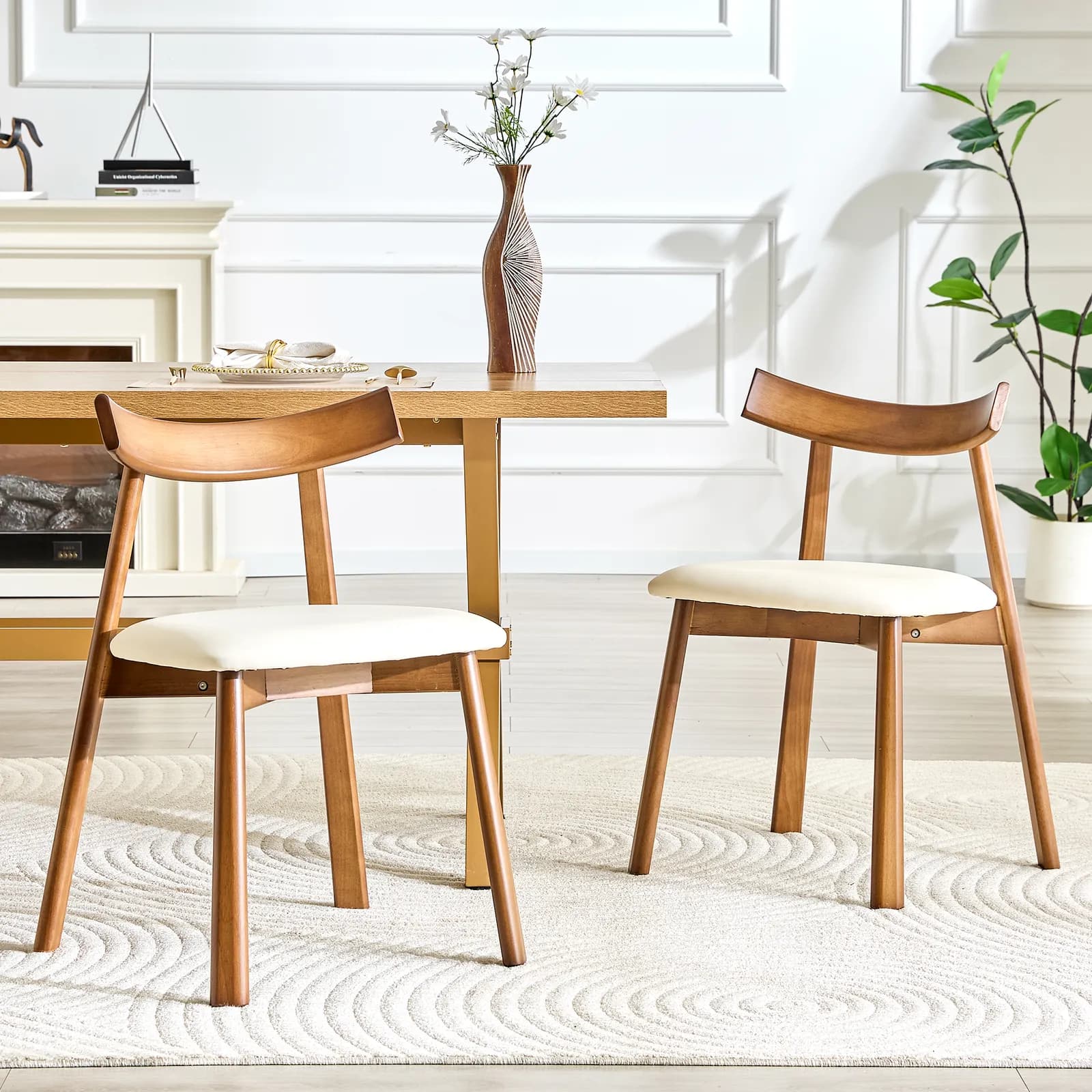 2 walnut colored solid wood dining chairs, with white PU soft cushions and curved…