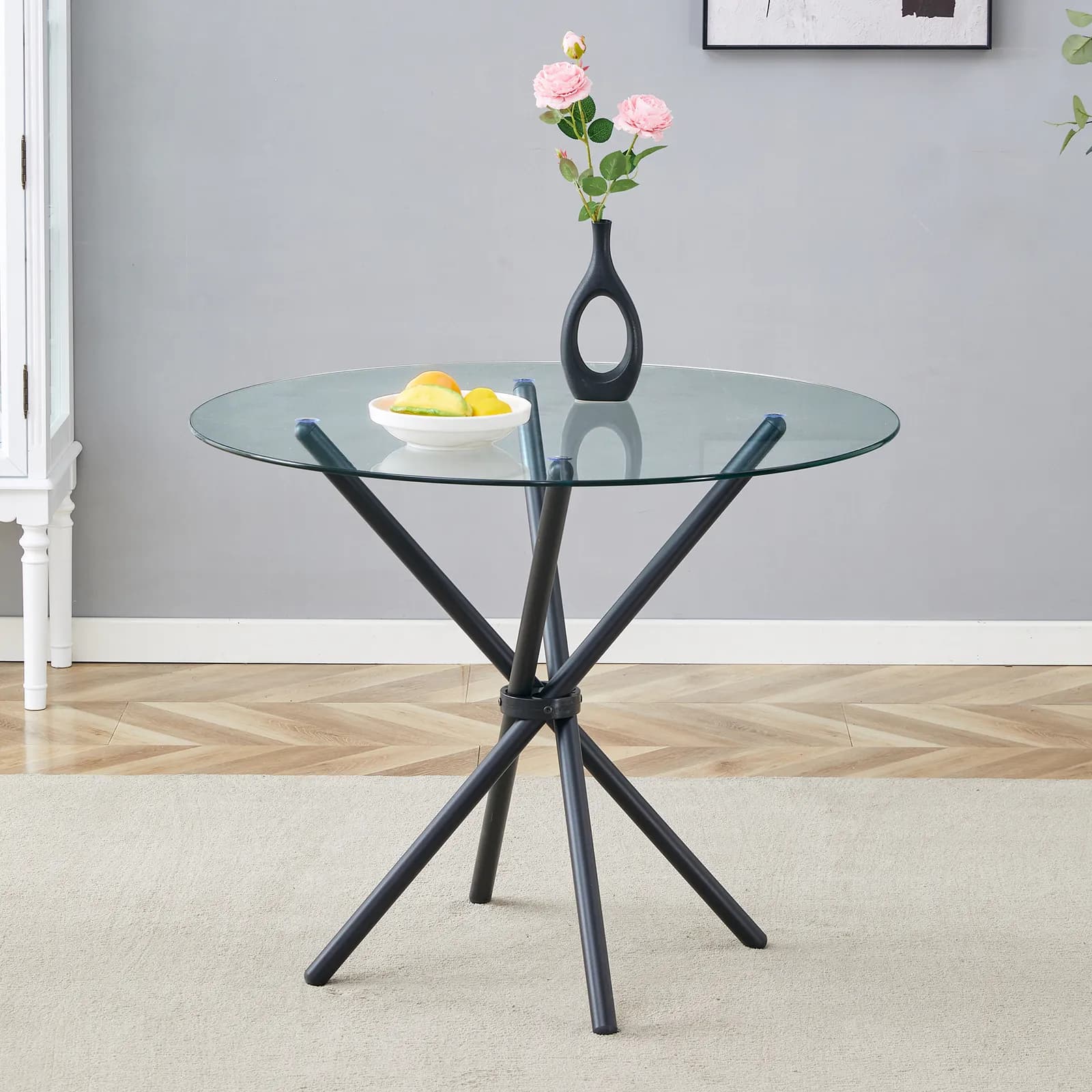 A circular transparent tempered glass round table with a diameter of 36, 6 inches, with…