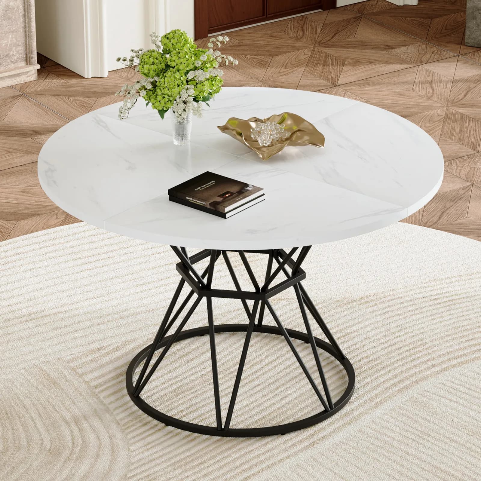 A circular dining table with a diameter of 47, 3 inches, composed of 4 white marble…