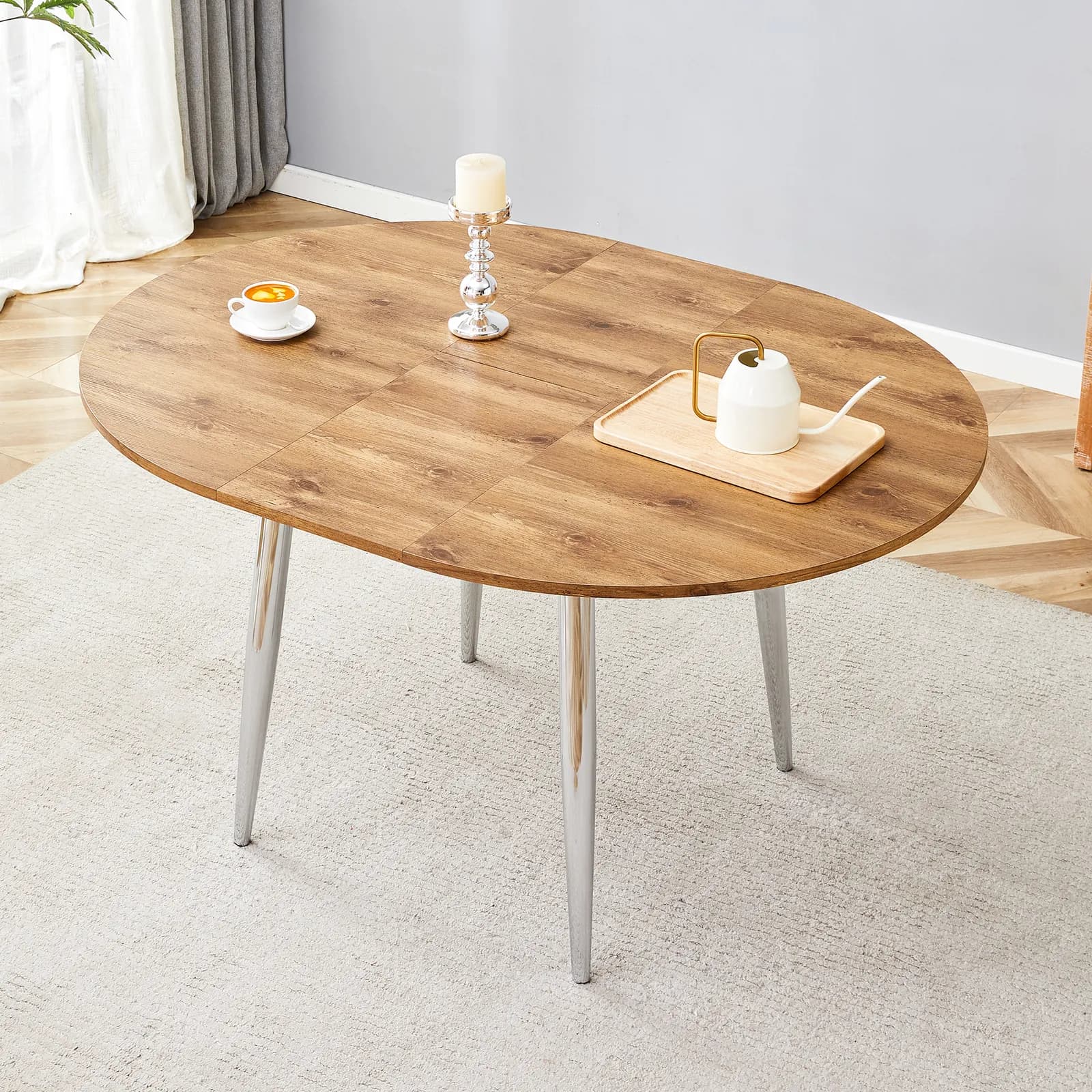 With a clever retractable mechanism, the Wood Grain MDF table top and silver metal legs…