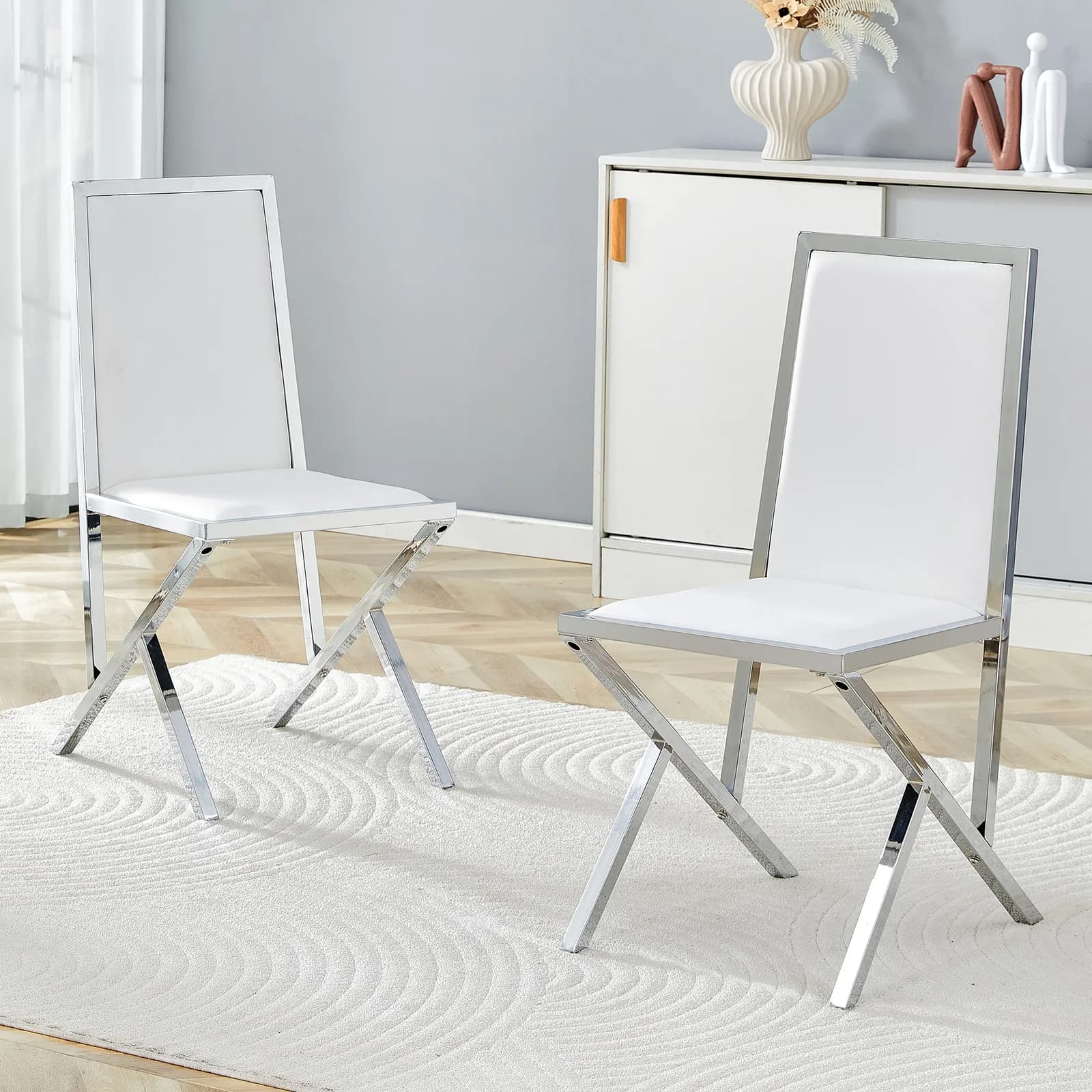 2-pack silver metal framed white PU dining chairs: ergonomic design, a simple and…