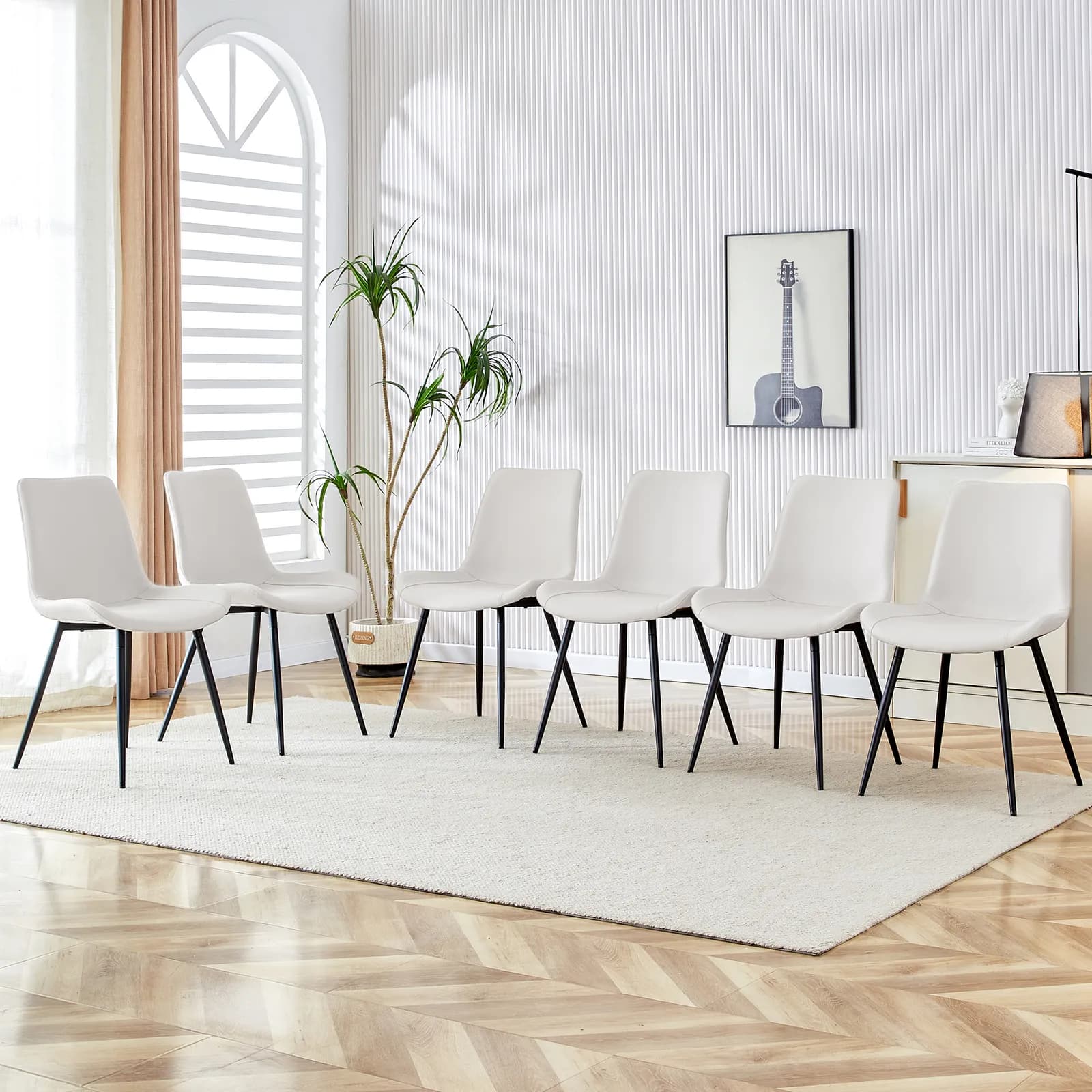 White artificial leather backrest cushion dining chair, black metal legs, curved widened…